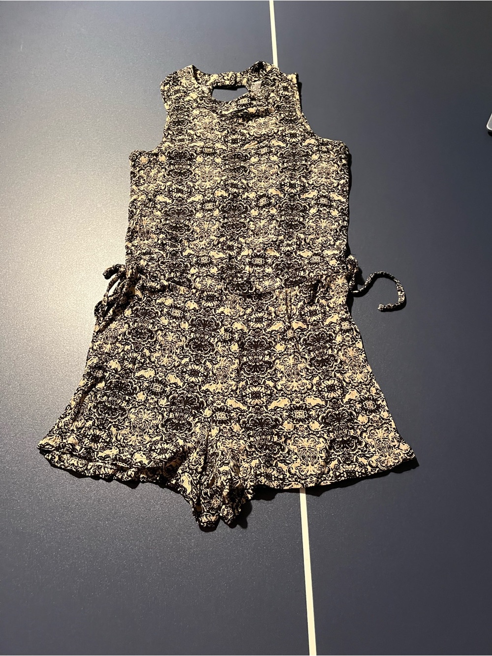 Mimi Chica Black and Cream Patterned Sleeveless Romper